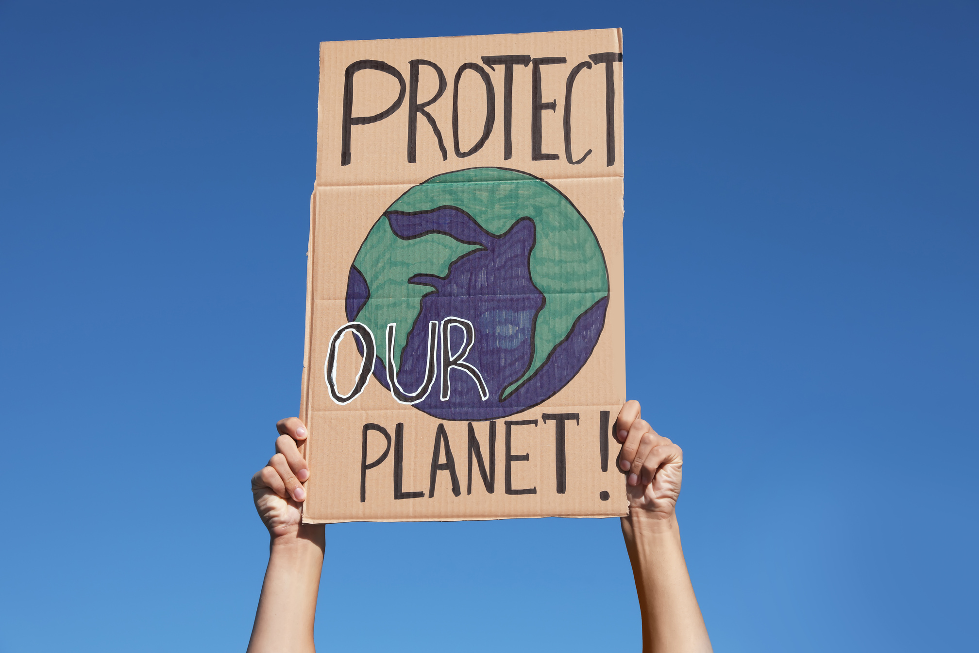 Man with Poster Protesting against Climate Change Outdoors, Clos